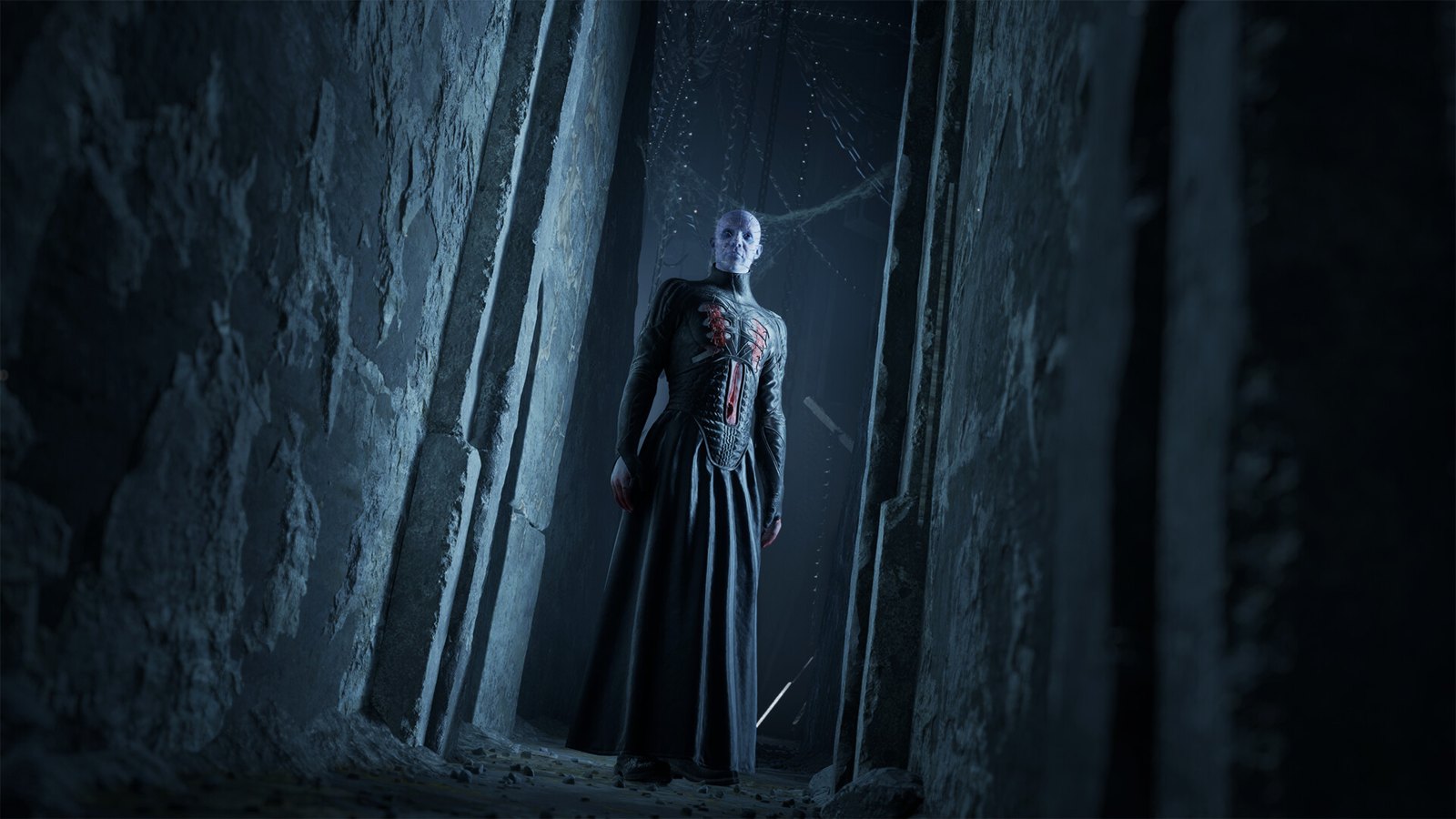 Hellraiser: Revival screenshot showing a robed figure between tall stone walls