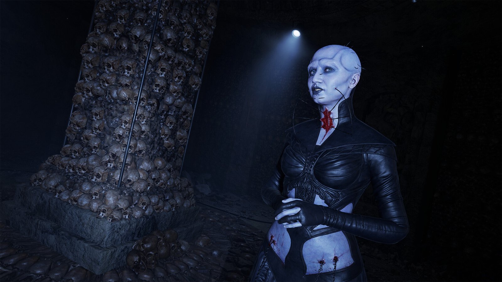 A pale figure in dark clothing stands beside a stone pillar.